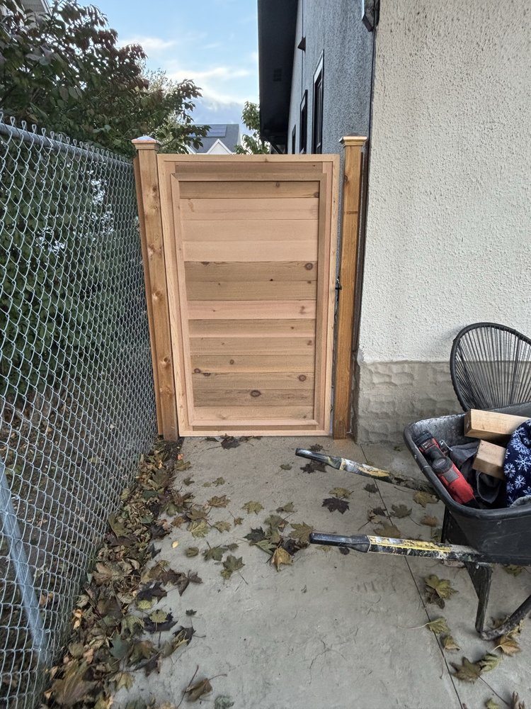 Custom cedar gate built into an existing chainlink line